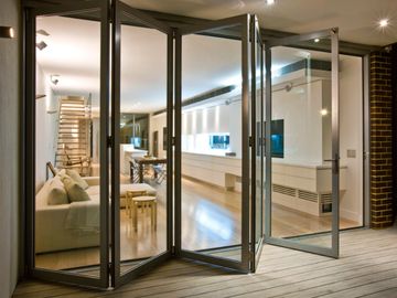 Glass and Aluminium Bi-Fold door from living area to outdoors