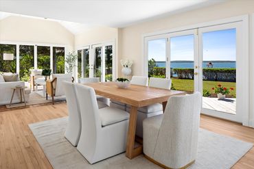 Hamptons home staging -- dining room in waterfront home staged in neutral colors.