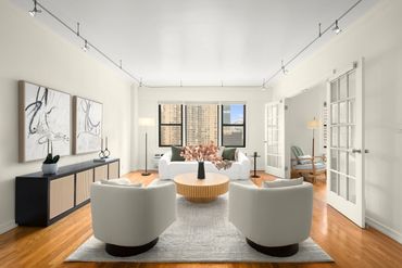 Image of NYC home staging living room, with autumnal colors 