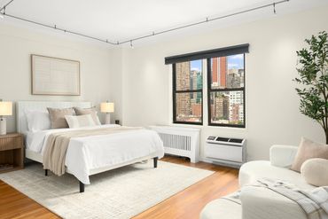 Image of HomeWear Designs' NYC home staging in a bedroom. 