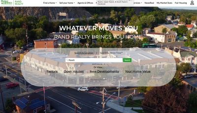 Rand Realty homepage with home search feature.