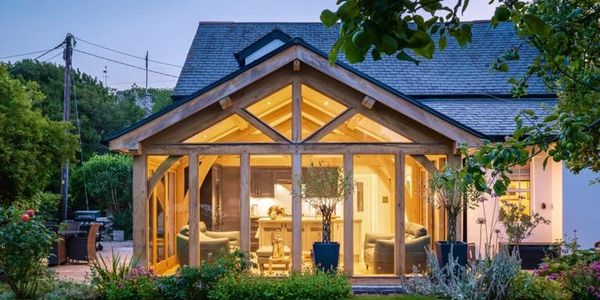 Oak frame extension at night