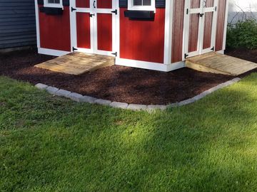 Adding trim to the bottom to cover the pressure treated boards pulls the look together. 