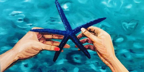 TITLE: A blue starfish in Cebu, Mother and Daughter hands, 2018