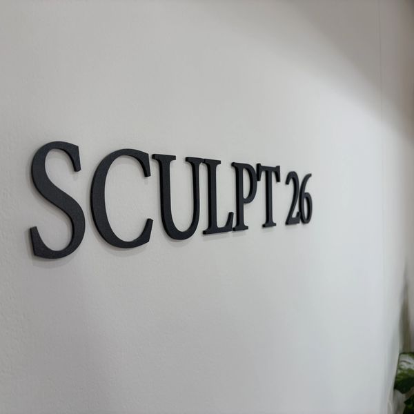 Sculpt 26 Logo on Wall