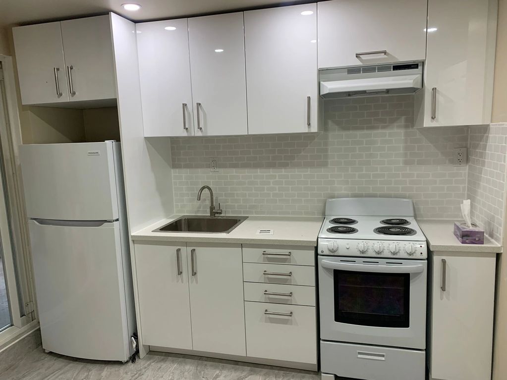 Ikea kitchen installation. Kitchen renovations, cabinetry, appliance install. Kitchen backsplash.