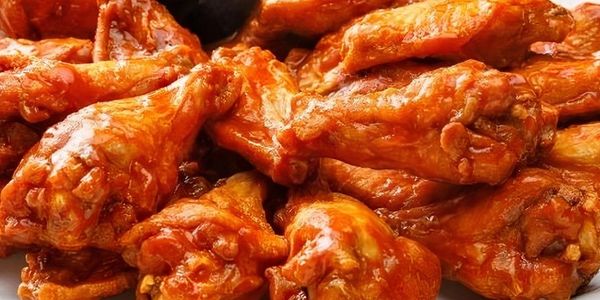 Spicy wings delivered to you with app’s DoorDash or uber eats 