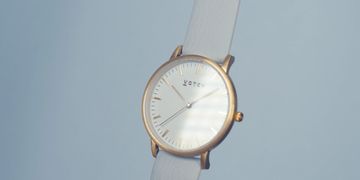 a still image from a product video featuring a light blue watch