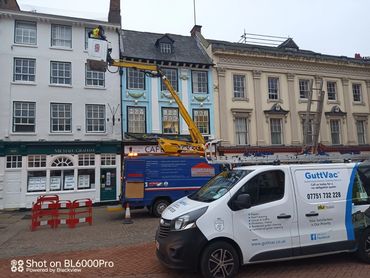 Professional gutter cleaning in Northampton, UK, featuring expert cleaning and repair services