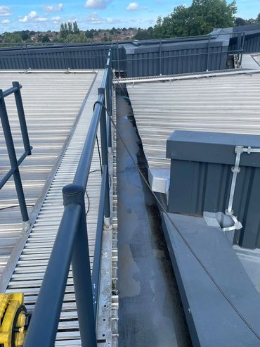 Commercial roof and gutter cleaning