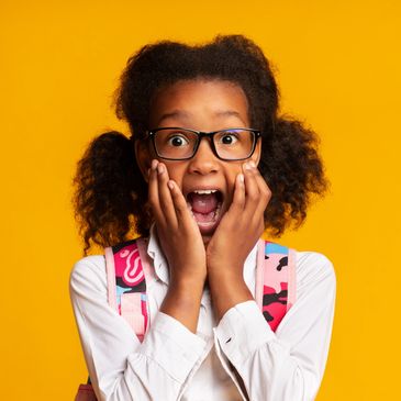 Black private academic tutoring and executive function student with an excited face from success.