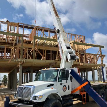 We service the residential construction industry with crane service. 