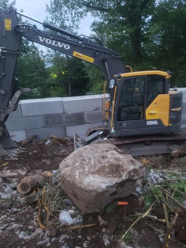 Installation of a waste block retaining wall