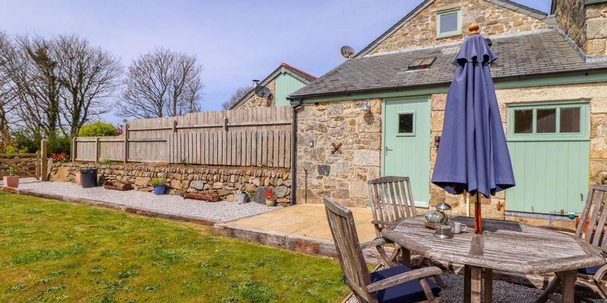 Large fenced garden in Hideaway Barn holiday let near Praa Sands in Cornwall