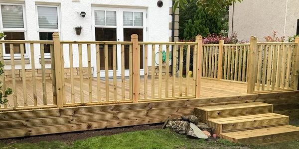 Raised decking example with safety rails and steps.