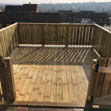Decking with safety rail and gates.