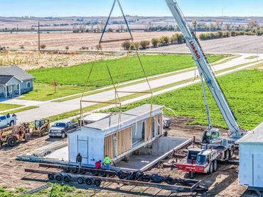 Construction crane home setting in place