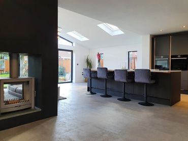 Modern extension with dual aspect fireplace and pitched roof in Formby