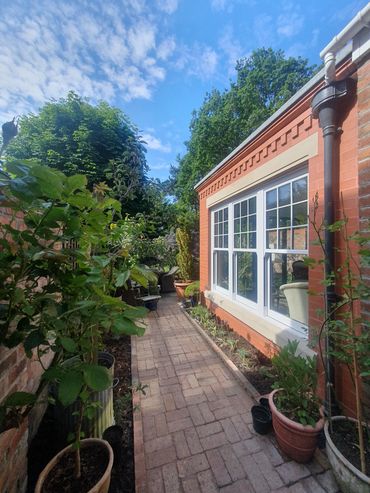 Engineering brick extension on Victorian house in Southport