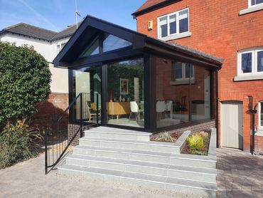 pitched roof steel, aluminium and glass extension in Southport