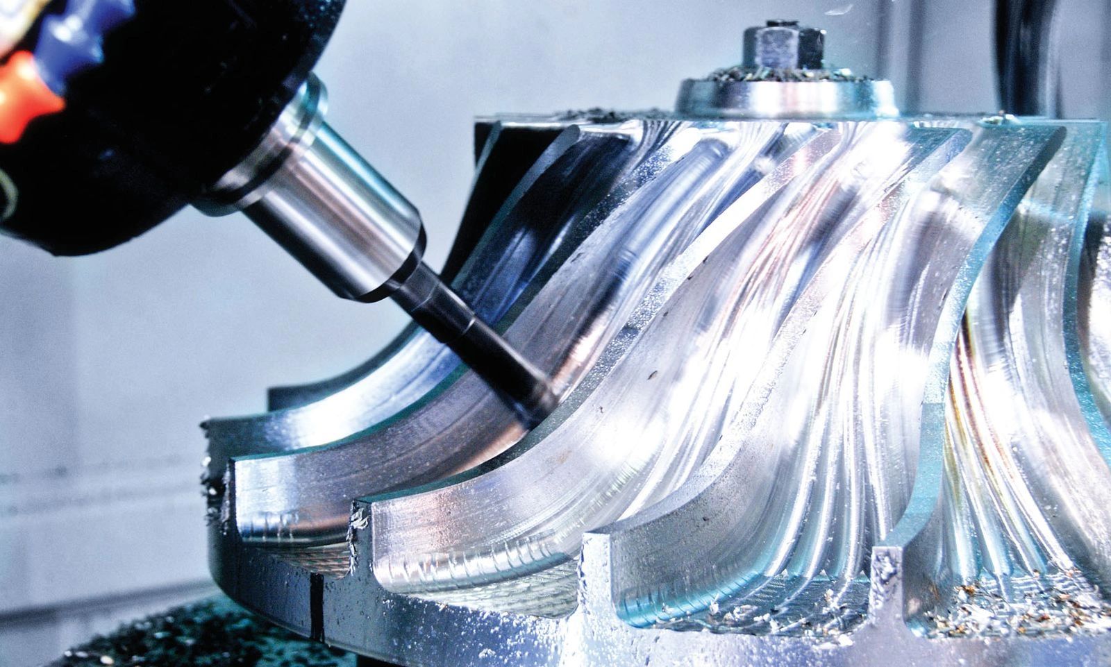 Close-up of milling machine cutting metal.