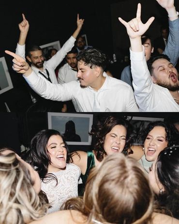 A couple and their guests dancing at their wedding