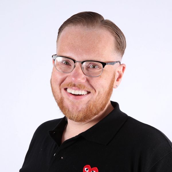 a headshot of Art Frick wearing a black polo shirt