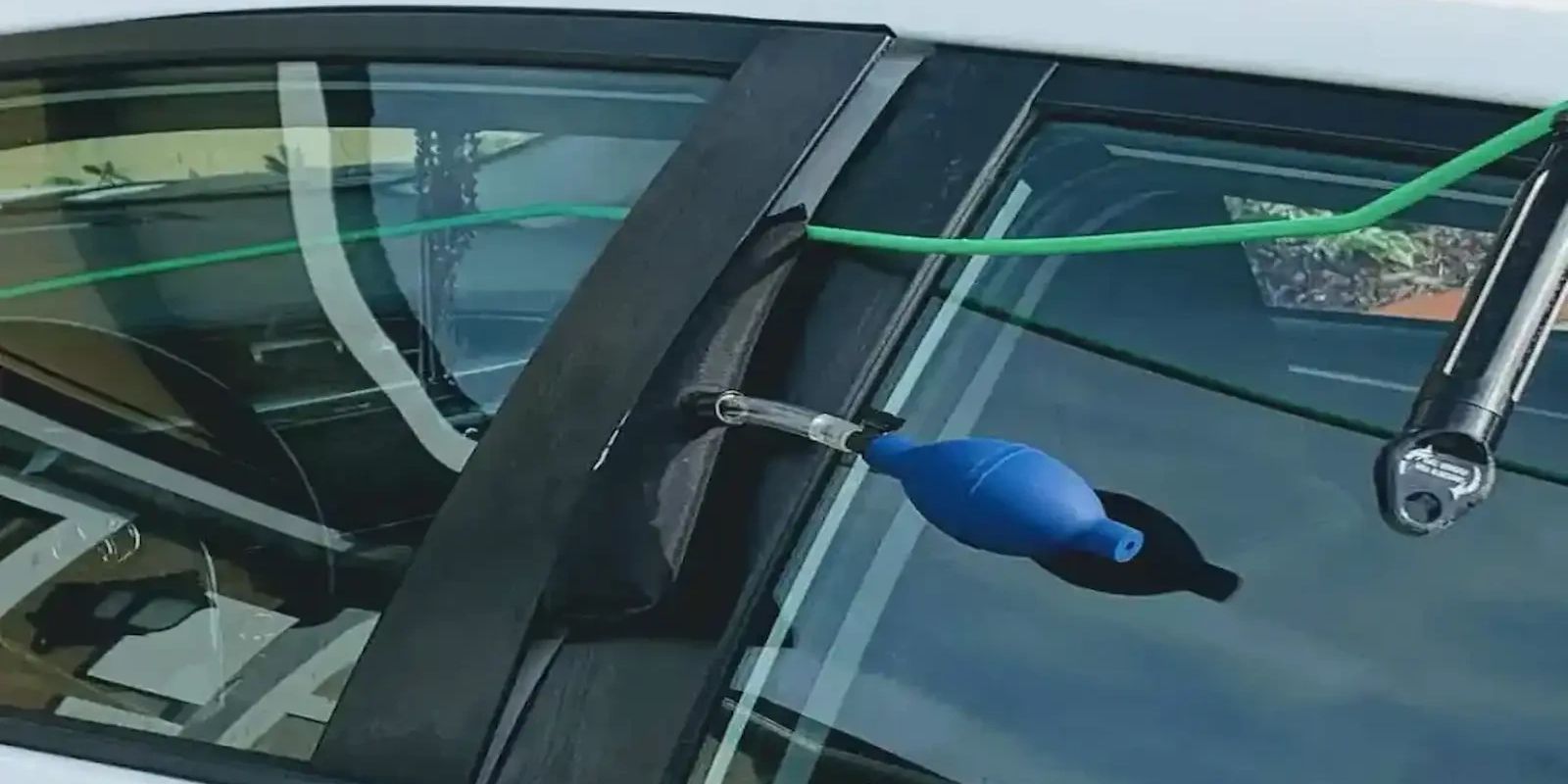 Professional car lockout service unlocking vehicle door in Bloomington Indiana