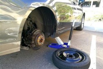 Flat tire change and spare install by Daniels 24/7 Roadside Assistance Bloomington IN.