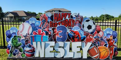 Jumbo yard prop in leawood kansas yard card in red and blue wesley name
