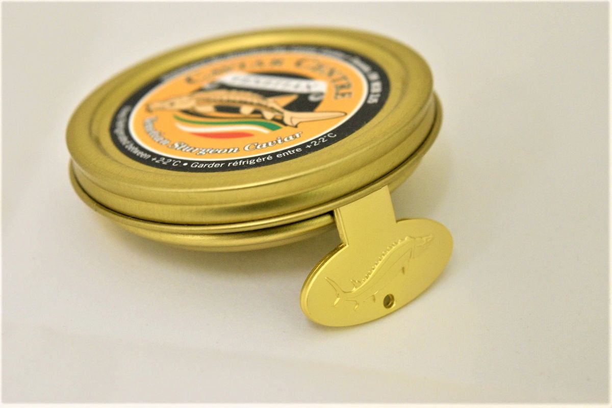 https://img1.wsimg.com/isteam/ip/45b86830-2867-43f2-bba8-c25456403526/ols/Gold-Caviar-Tin-Opener-Caviar-Centre-.jpg/:/rs=w:1200,h:1200