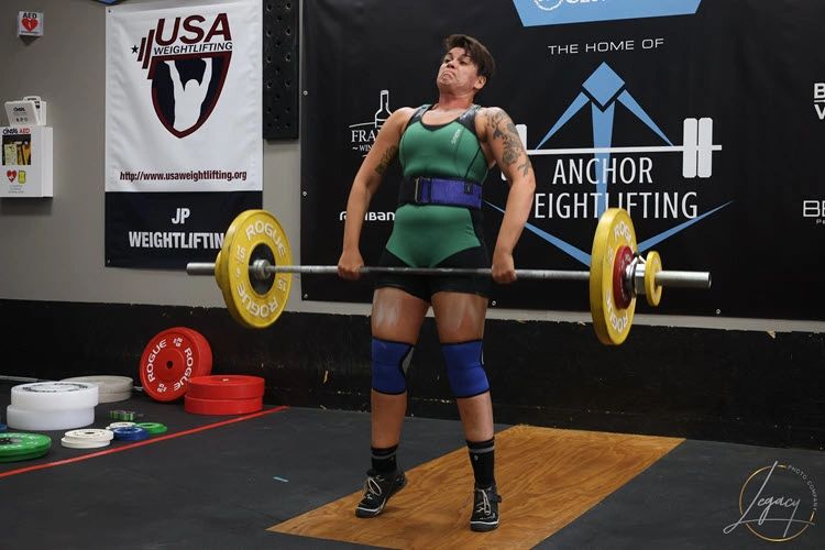 Athlete performing a clean lift