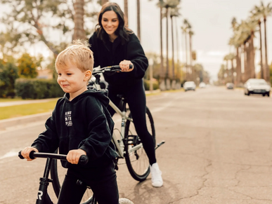 Mother and son riding bikes