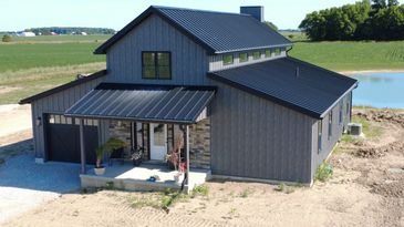 Board n batten siding standing seam roof