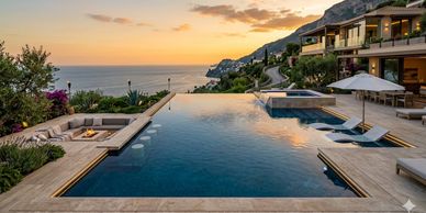 Luxury infinity pool overlooking the ocean at sunset.