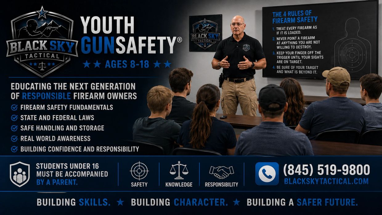 Instructor teaches youth firearm safety fundamentals to a classroom of attentive students.