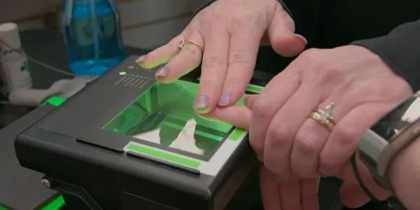Man touch lives fingerprint