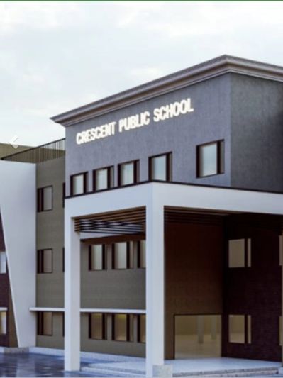 Modern school building with Crescent Public School signage.