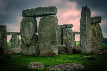 Ancient stone circle at dusk.