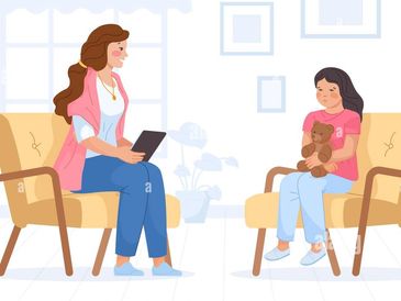 Therapist talking to a child holding a teddy bear.