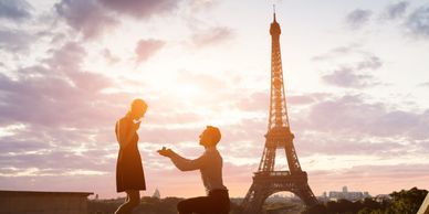 Woman being proposed to infront of the eiffel tower