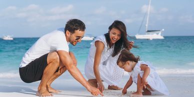 Family enjoying time on the beach.