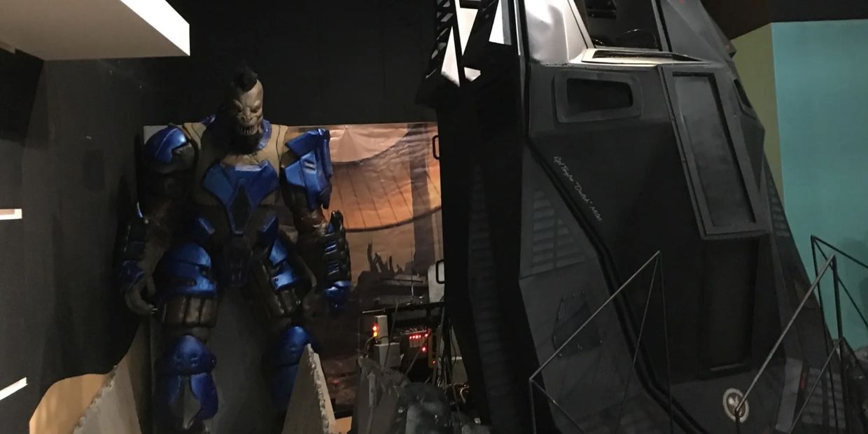 Halo Covenant Brute in front of an ODST drop pod flight simulator