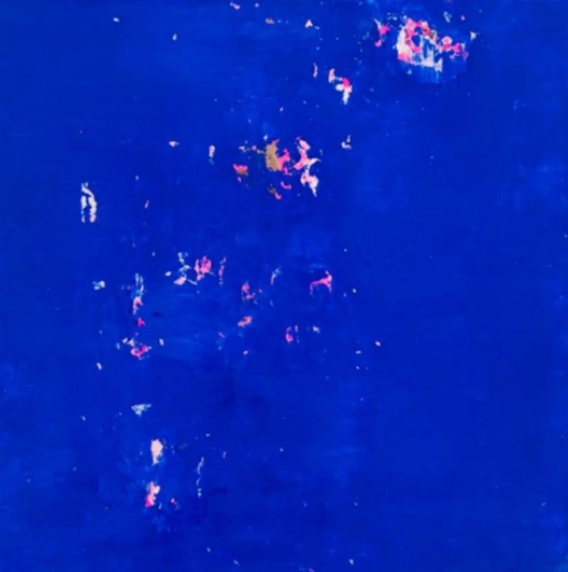 Abstract blue painting with pink and yellow accents.