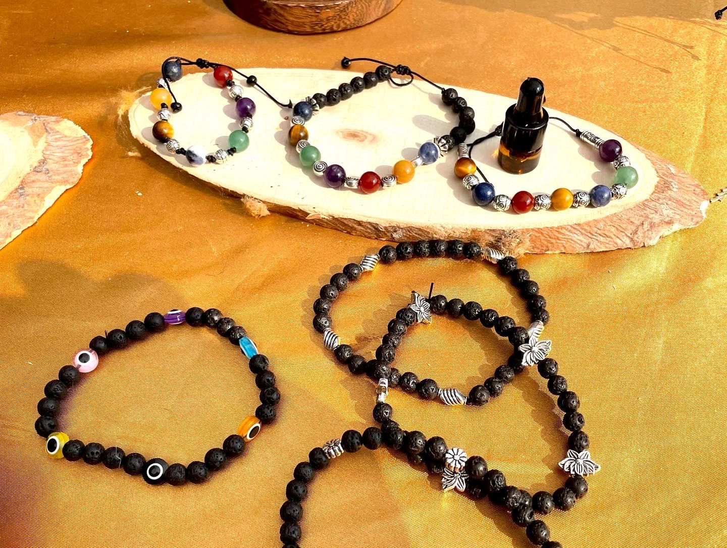 Lovely seven chakras' bracelets with lava beads to add your favorite essential oil.