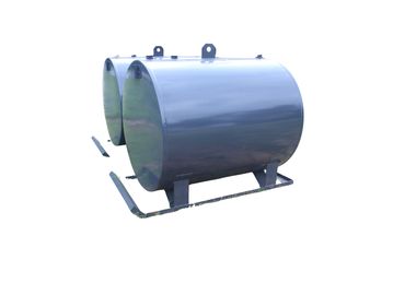 Two large cylindrical metal tanks on a metal frame.
