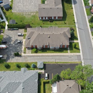 Aerial view of residential houses and streets.