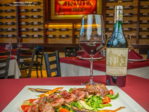 Food & Wine Pairing Image
Signature Italian dish paired with curated wine at Invita Antonello’s Kitc