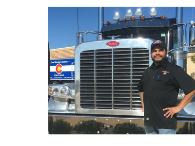 Owner Cipriano Duran with A Good Moving Company’s flagship truck in Fort Collins.