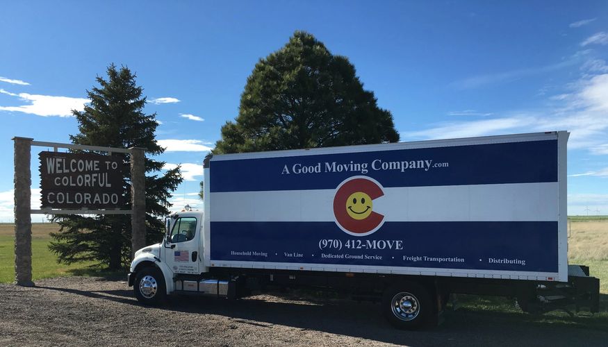 A Good Moving Co. truck at Colorado sign, trusted Fort Collins movers serving Northern Colorado.